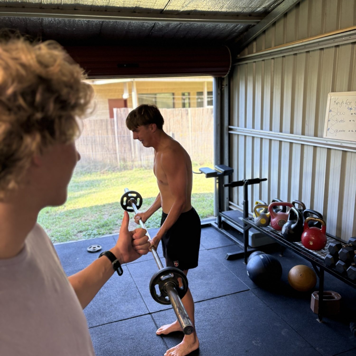 A teenager training in a gym